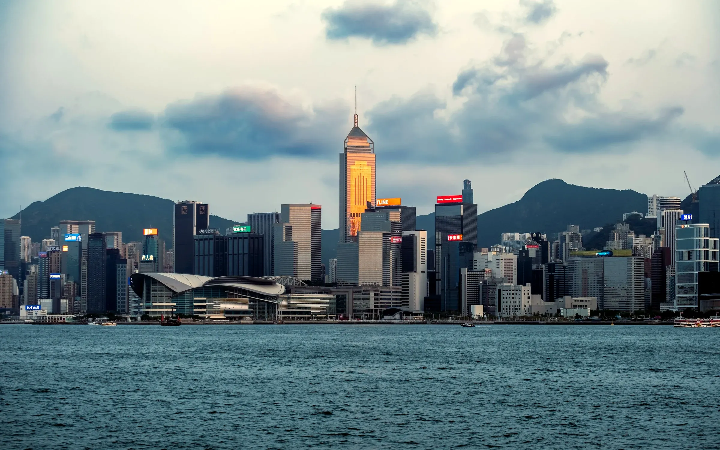Hong Kong skyline at sunset, Central Plaza and Victoria Harbour